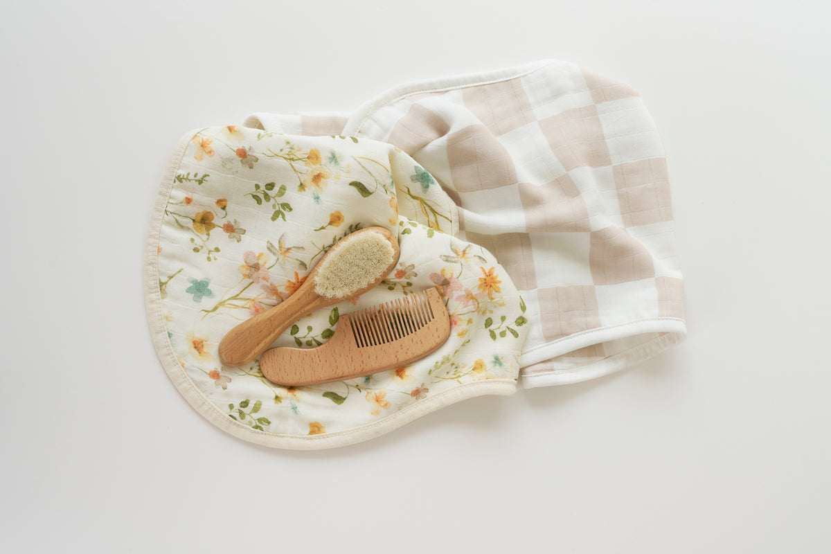 Baby care set items laid out together