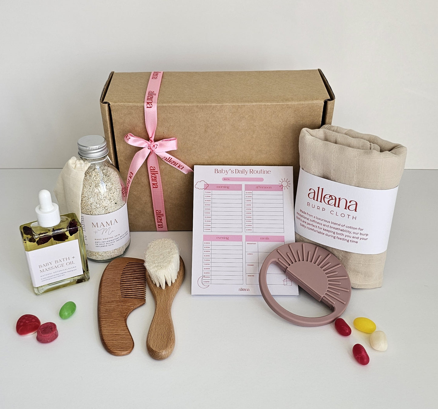 Welcome baby girl bundle contents laid out