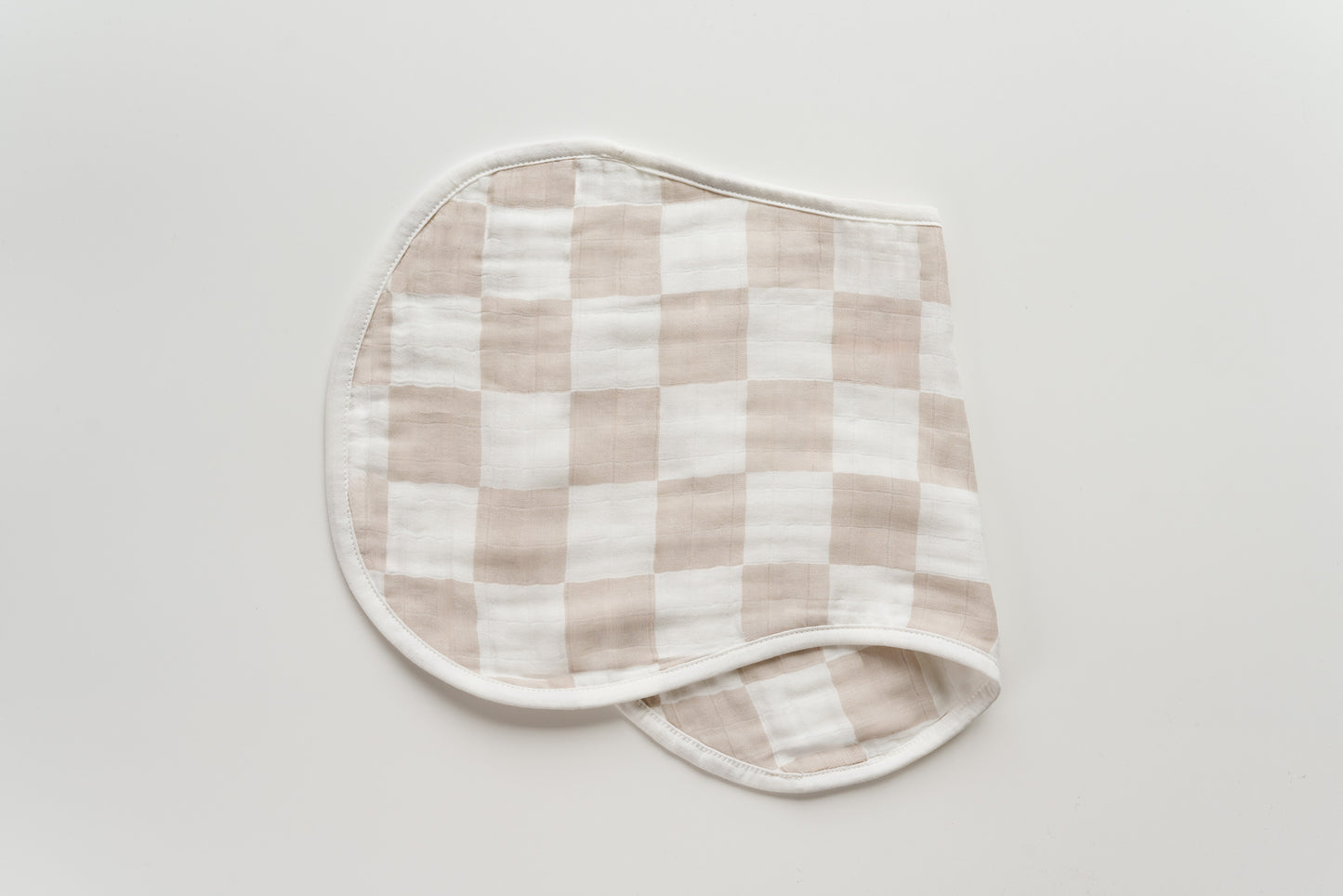 Checkered burp cloth included in the baby care set