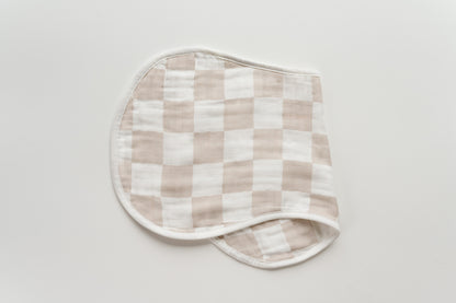 Checkered burp cloth included in the baby care set