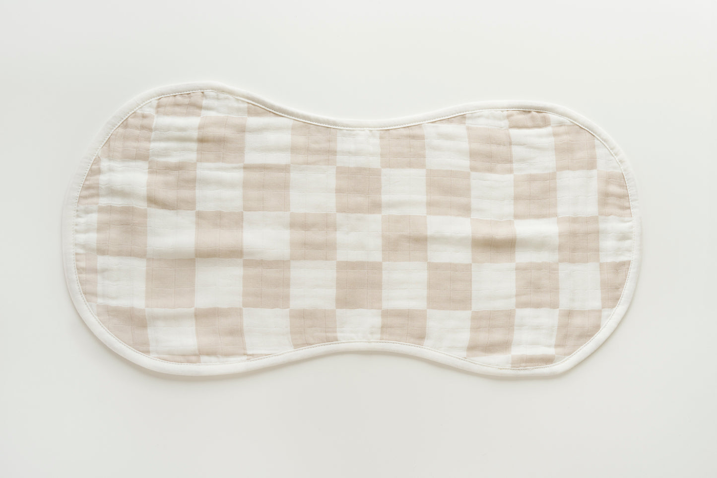 Soft checkered burp cloth folded showing texture