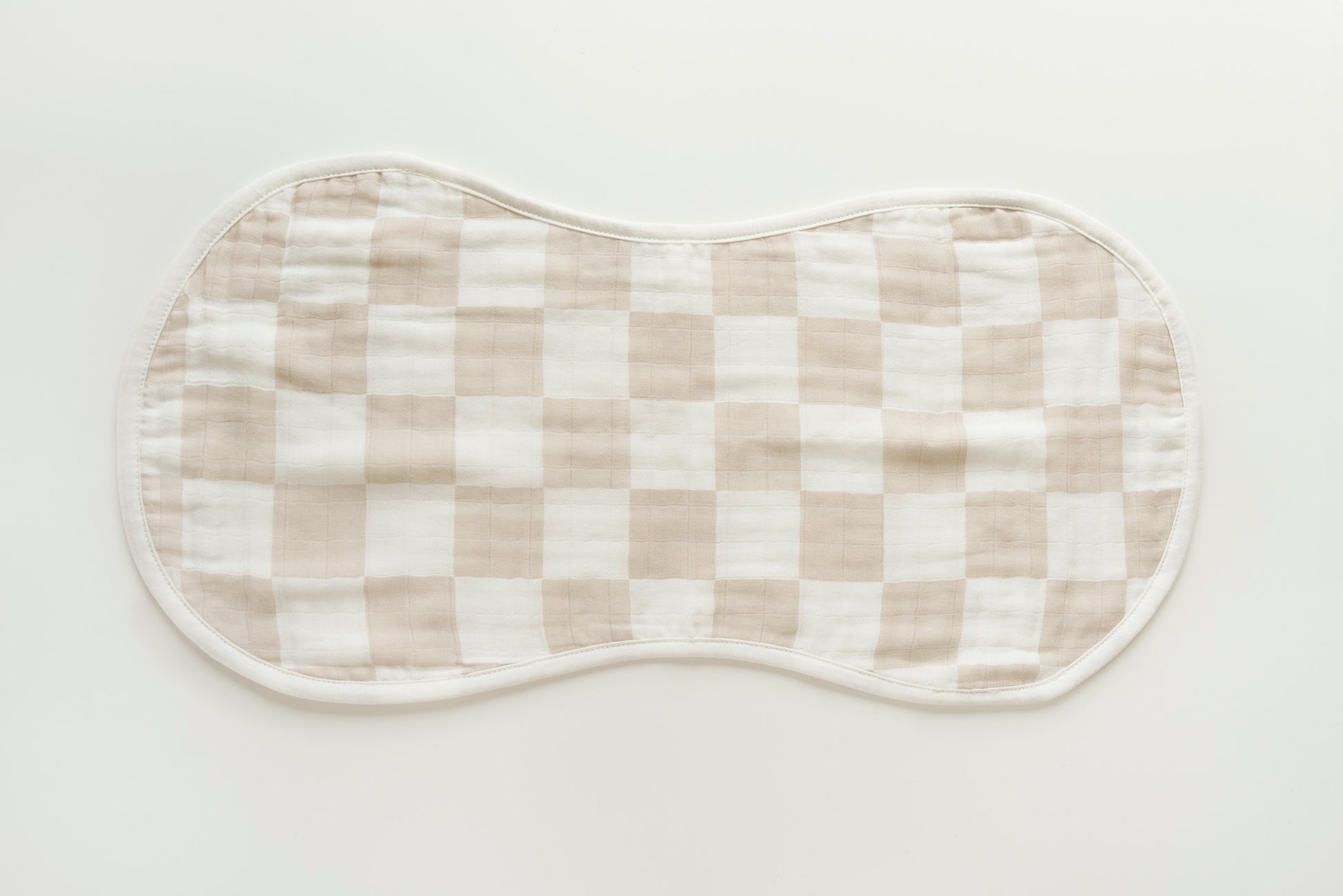 Soft checkered burp cloth folded showing texture