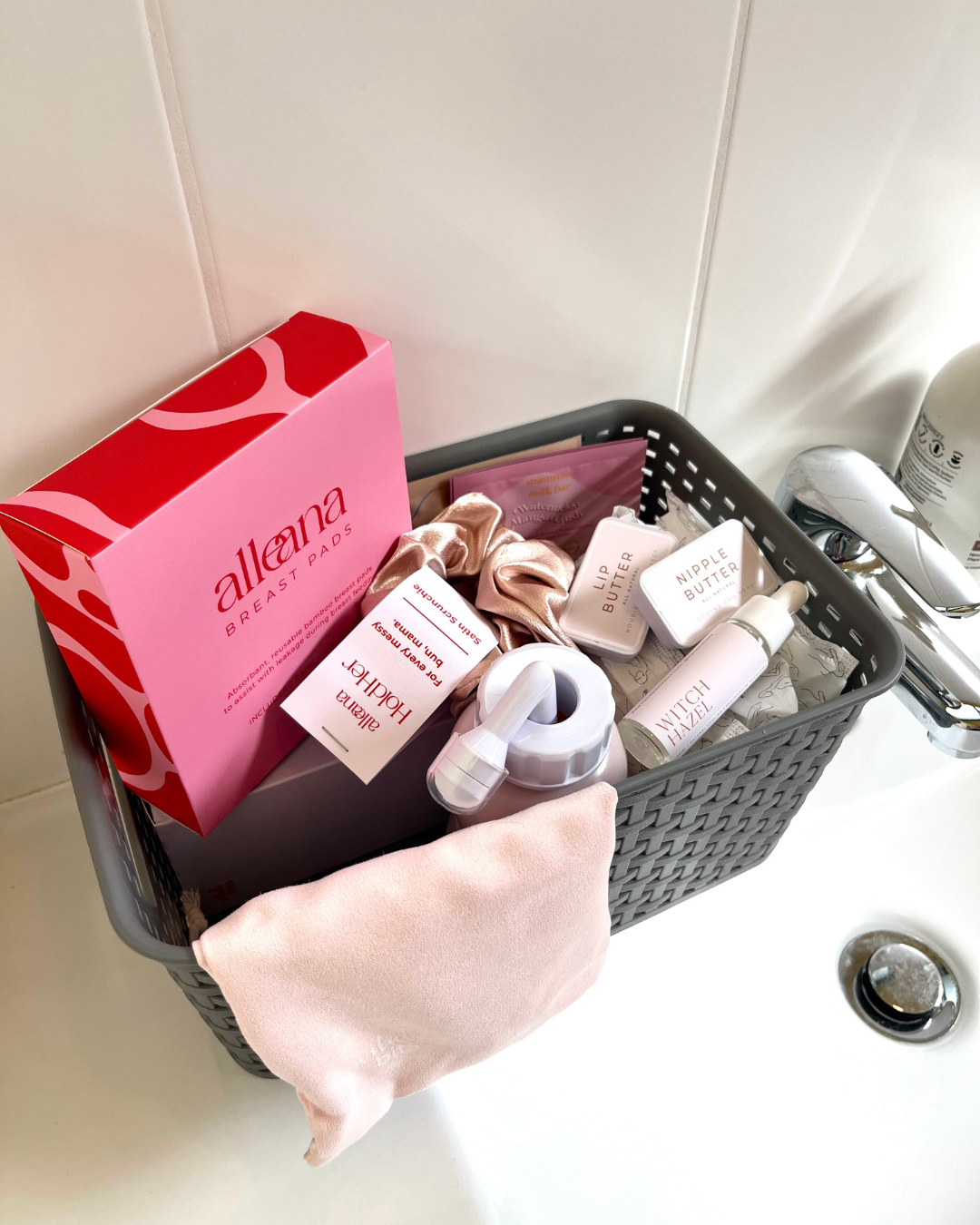 Postpartum bundle contents including maternity pads and witch hazel